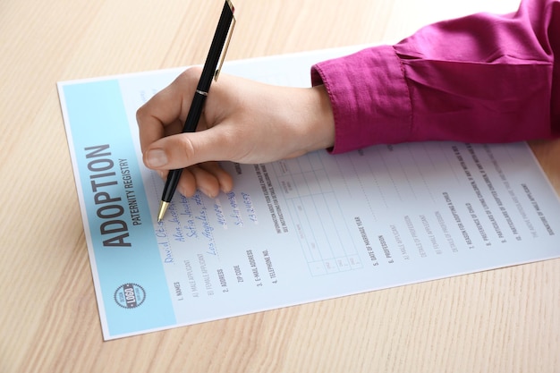 A close-up shot of a FAFSA form being filled out, emphasizing the importance of applying for federal student aid.
