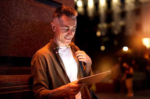 A person on the phone, smiling and taking notes. They are in a brightly lit office setting, suggesting a successful negotiation with a creditor. The focus is on their positive expression and organized approach.