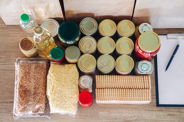 A close-up shot of a well-organized pantry with neatly stacked cans, jars, and containers, showcasing a variety of ingredients. Labels are visible, making it easy to identify each item.