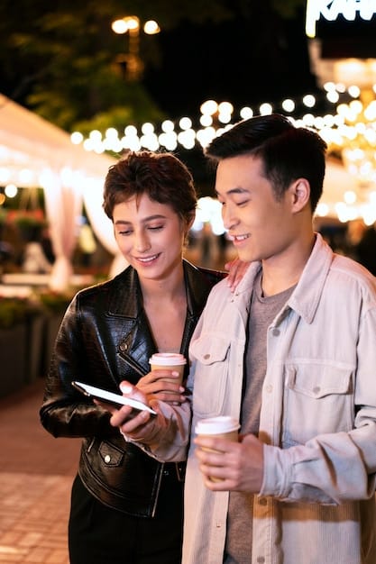 Two young Korean actors in a romantic comedy scene, one holding a smartphone with a dating app on screen, both smiling at each other.