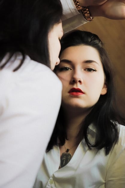 A close-up scene from a dorama, focusing on the actors' expressions. The intimacy coordinator is subtly visible in the background, observing the scene and ensuring the actors' comfort and adherence to agreed-upon boundaries. The lighting should be soft and natural, enhancing the emotional depth of the scene.