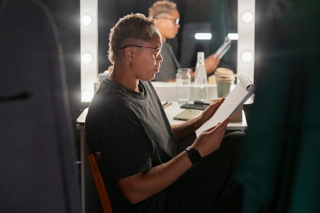 A close-up shot of a director of casting intensely watching a young actress performing a scene during an audition in a well-lit studio.