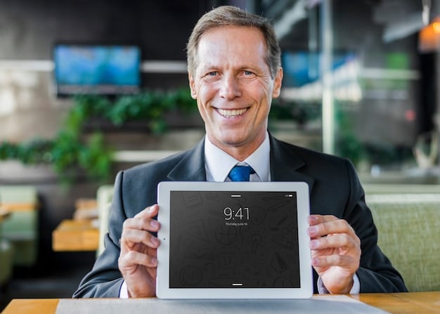 A close-up portrait of a producer executive in a professional setting, smiling confidently. The person is holding a tablet with production data displayed on the screen.