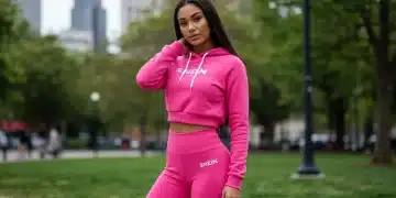 Woman in pink Shein athleisure set in urban park