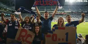 Enthusiastic sports fans celebrating at a stadium during an event